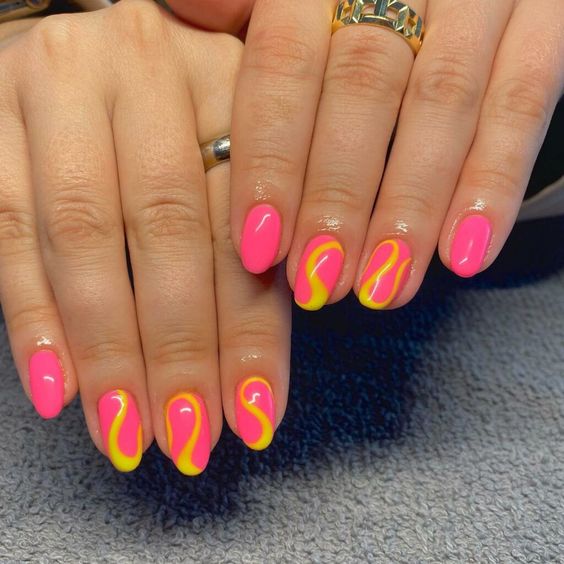Yellow and pink nail designs