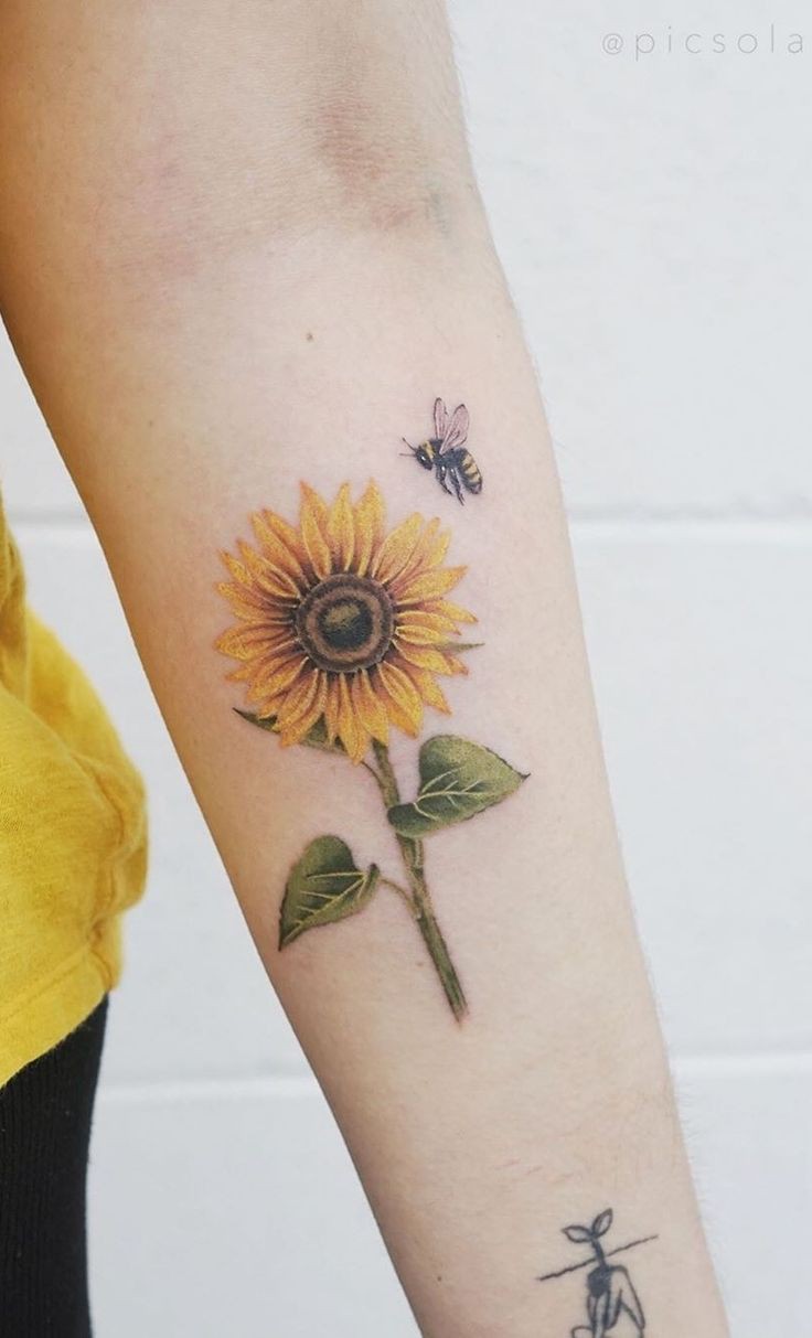 hand sumflower tattoo